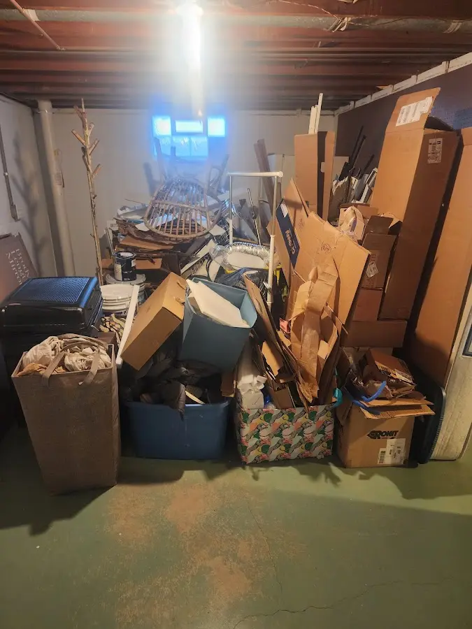 Roll-off dumpster container at job site for Construction Dumpster Rental in Petoskey